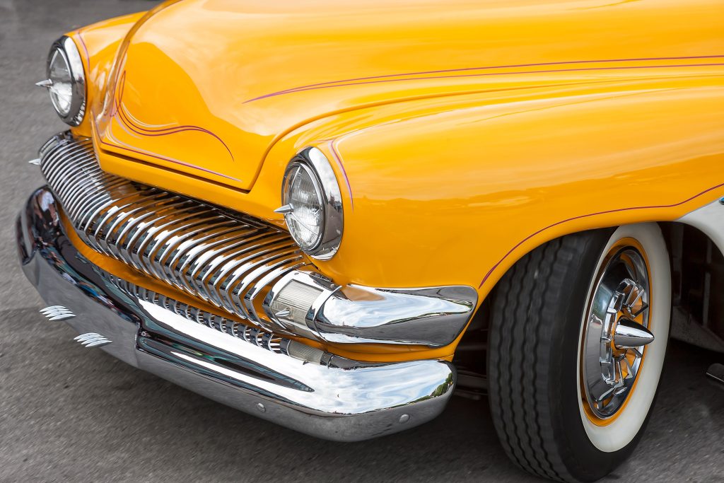 The front of a vintage car
