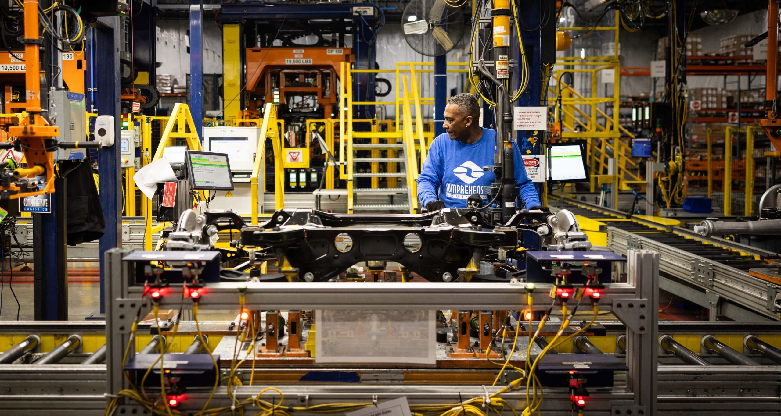 A man working on an assembly line